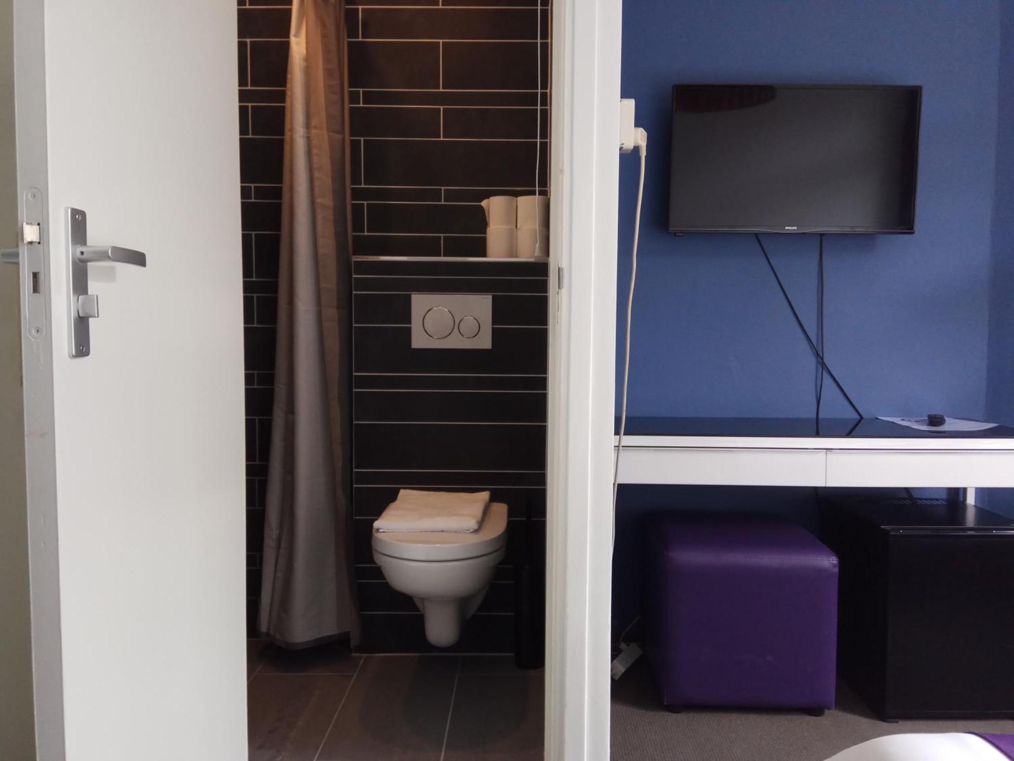Hotel Bellington Амстердам Стая снимка